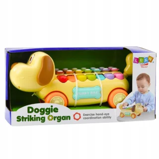 Jeżdżący Piesek Cymbałki Ruchome Uszy Ogon Pałeczka Na Sznurku